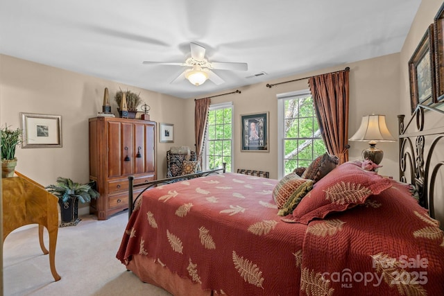 6914 Riesman Ln Unit 95, Charlotte, NC 28210 - bedroom featuring light carpet, a ceiling fan, and visible vents