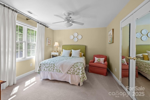 6914 Riesman Ln Unit 95, Charlotte, NC 28210 - carpeted bedroom with ceiling fan, baseboards, french doors, and visible vents