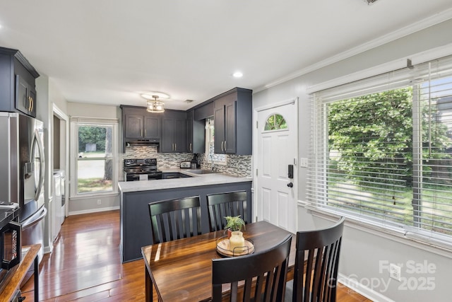 6412 Old Meadow Rd, Charlotte, NC 28227 - kitchen with black electric range oven, stainless steel fridge, a sink, baseboards, and light countertops