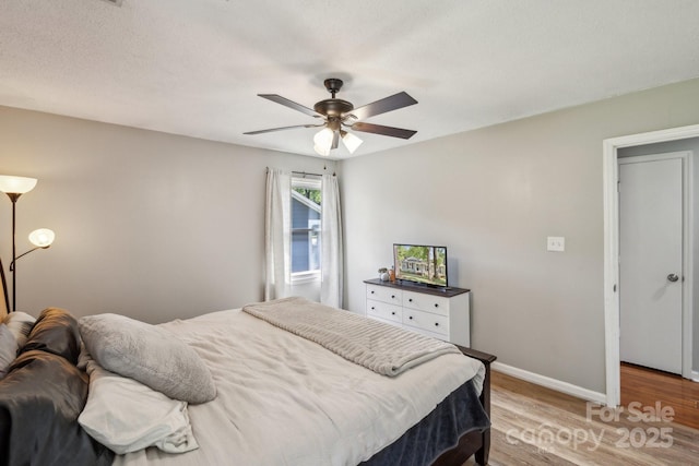 6412 Old Meadow Rd, Charlotte, NC 28227 - bedroom featuring light wood-type flooring, baseboards, and ceiling fan