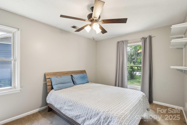 6412 Old Meadow Rd, Charlotte, NC 28227 - carpeted bedroom featuring baseboards and ceiling fan