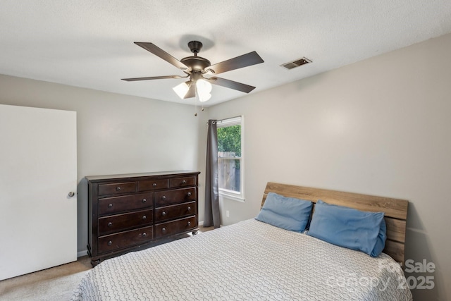 6412 Old Meadow Rd, Charlotte, NC 28227 - carpeted bedroom featuring a ceiling fan