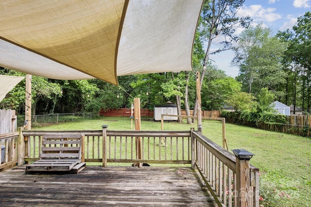 6412 Old Meadow Rd, Charlotte, NC 28227 - wooden terrace featuring a storage unit, an outbuilding, and view of wooded area