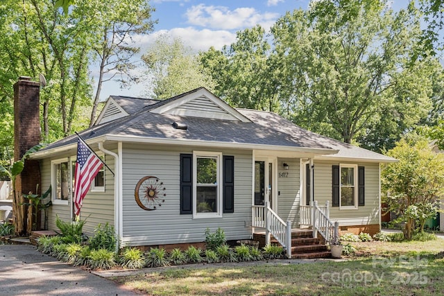 6412 Old Meadow Rd, Charlotte, NC 28227 - view of front of house featuring crawl space and a shingled roof