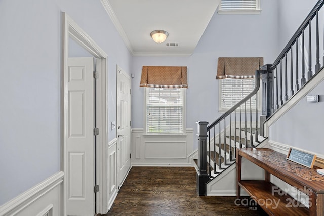 1948 Winpole Ln, Charlotte, NC 28273 - entryway featuring wood finished floors, stairway, ornamental molding, a wainscoted wall, and visible vents