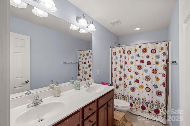 1948 Winpole Ln, Charlotte, NC 28273 - bathroom with toilet, a sink, tile patterned floors, and visible vents