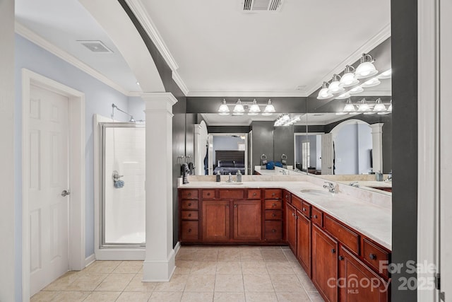 1948 Winpole Ln, Charlotte, NC 28273 - bathroom with ornate columns, a stall shower, ornamental molding, and vanity