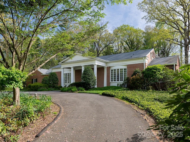 10 Stuyvesant Rd, Asheville, NC 28803 - view of front of property with brick siding and curved driveway