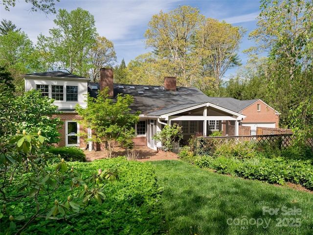 10 Stuyvesant Rd, Asheville, NC 28803 - rear view of property featuring a chimney and brick siding