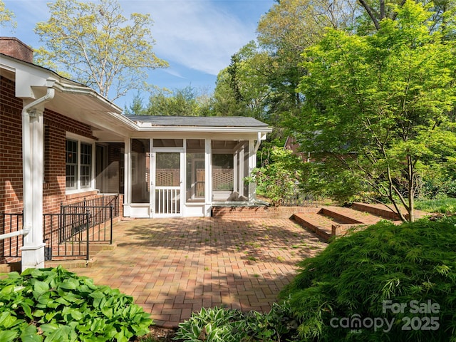 10 Stuyvesant Rd, Asheville, NC 28803 - view of patio featuring a sunroom