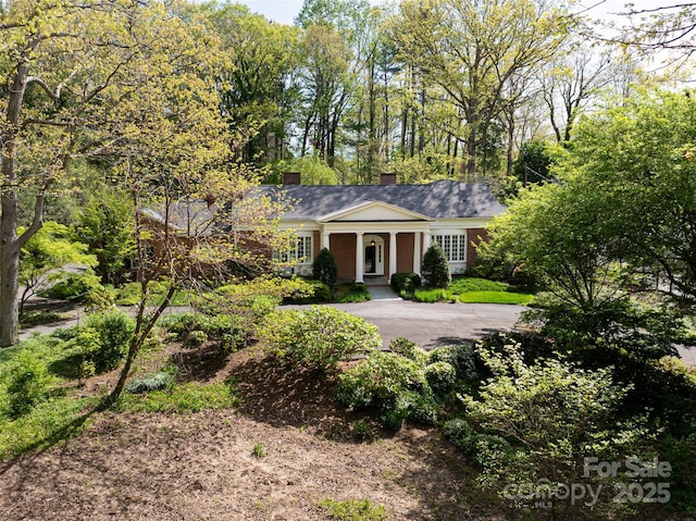 10 Stuyvesant Rd, Asheville, NC 28803 - neoclassical home featuring a chimney