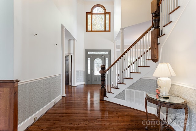 4950 Canterbury Pl, Morganton, NC 28655 - foyer with a towering ceiling, wainscoting, wood finished floors, and plenty of natural light
