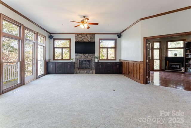 4950 Canterbury Pl, Morganton, NC 28655 - unfurnished living room featuring carpet flooring, ceiling fan, crown molding, and a fireplace