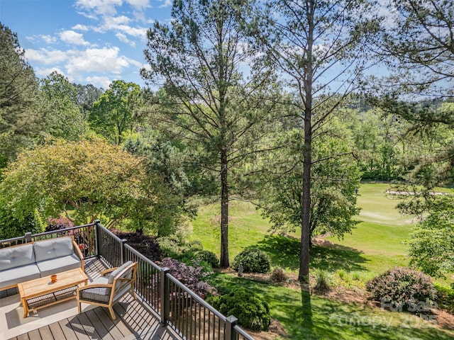 exterior space with a lawn and an outdoor living space