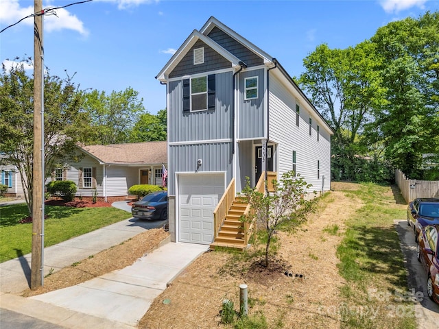 3205 Morning Dr, Charlotte, NC 28208 - traditional-style home featuring fence, an attached garage, a front lawn, board and batten siding, and concrete driveway