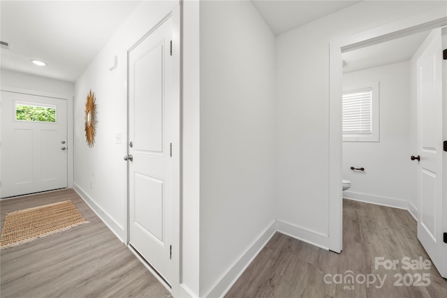 3205 Morning Dr, Charlotte, NC 28208 - hall with recessed lighting, baseboards, visible vents, and wood finished floors