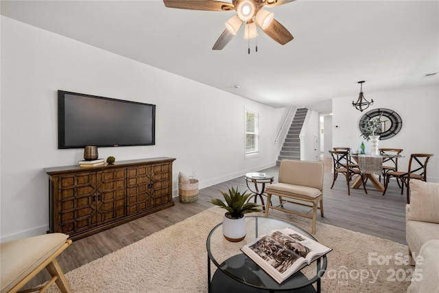 3205 Morning Dr, Charlotte, NC 28208 - living room featuring stairway, baseboards, a ceiling fan, and wood finished floors