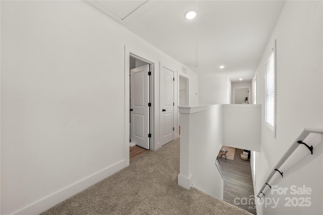 3205 Morning Dr, Charlotte, NC 28208 - hall with carpet floors, recessed lighting, baseboards, and an upstairs landing