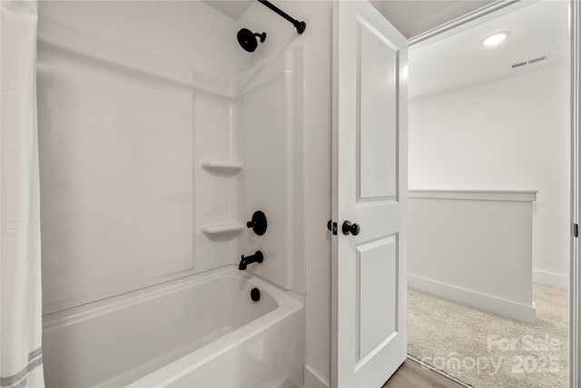 3205 Morning Dr, Charlotte, NC 28208 - full bath featuring shower / bath combination, baseboards, and visible vents
