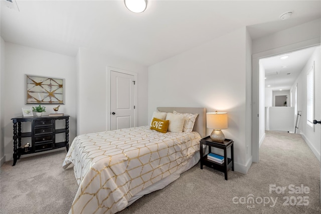 3205 Morning Dr, Charlotte, NC 28208 - bedroom featuring baseboards and carpet