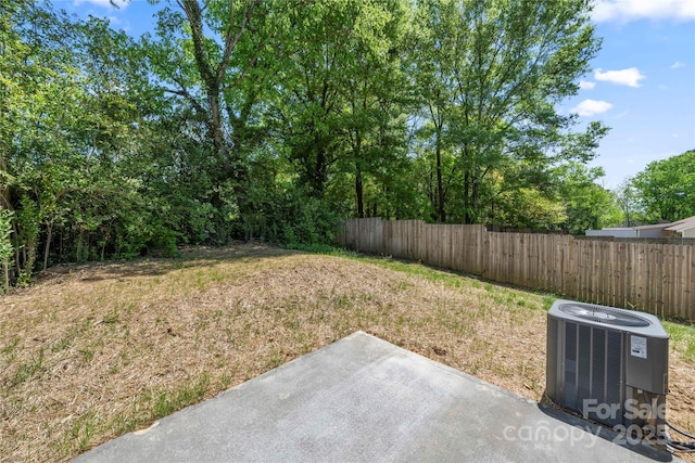 3205 Morning Dr, Charlotte, NC 28208 - view of yard with a patio, central air condition unit, and fence