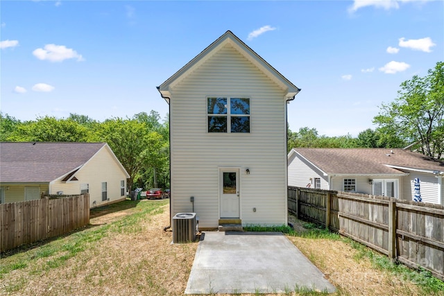 3205 Morning Dr, Charlotte, NC 28208 - back of property featuring a patio, central AC, and fence