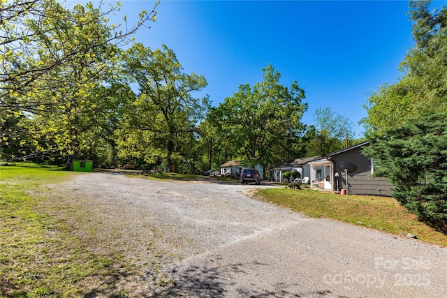 view of road featuring driveway