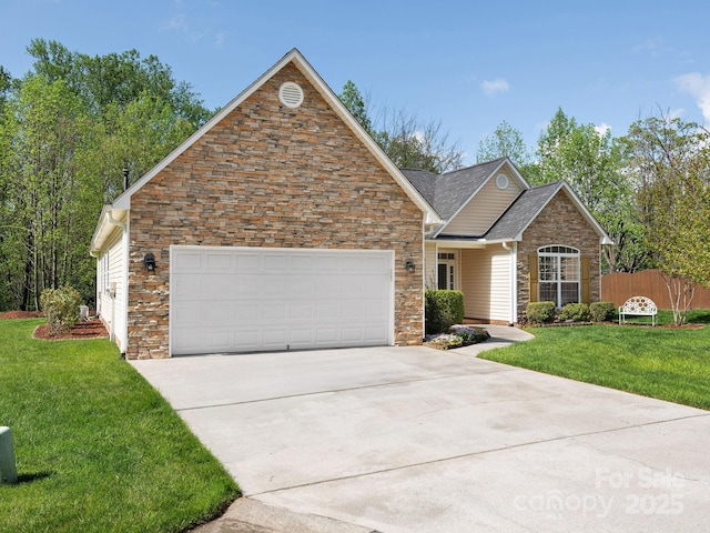 ranch-style house with a front lawn, driveway, stone siding, and a garage