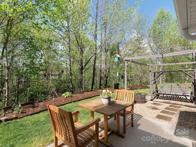 view of patio / terrace featuring a gate