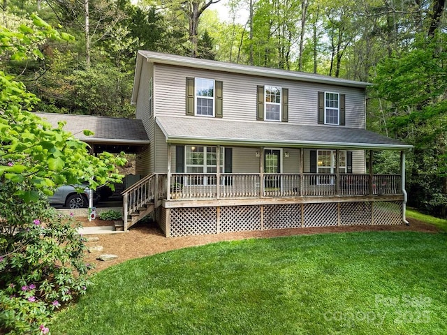 view of front of home with covered porch and a front lawn