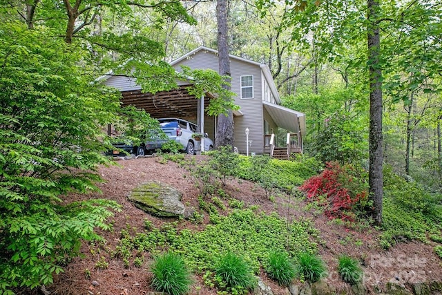 view of yard with a carport