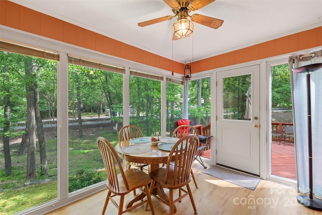 sunroom featuring wood finished floors