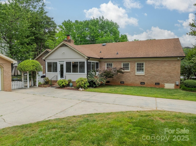 5522 Sharon Rd, Charlotte, NC 28210 - back of house with crawl space, a yard, brick siding, a chimney, and a shingled roof