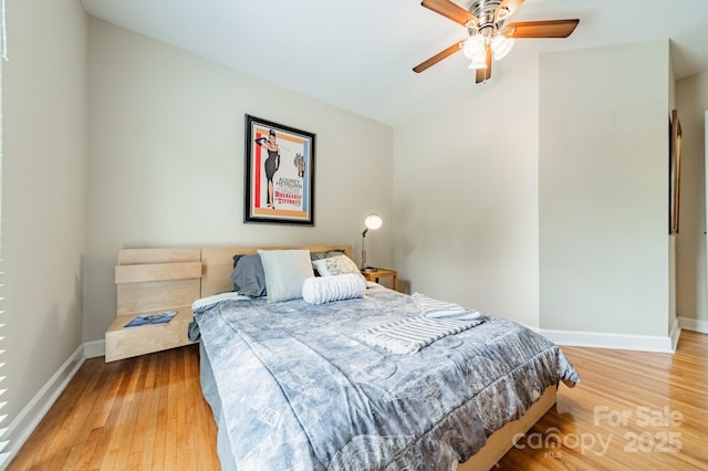 5522 Sharon Rd, Charlotte, NC 28210 - bedroom featuring wood finished floors, lofted ceiling, and ceiling fan