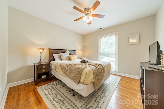 5522 Sharon Rd, Charlotte, NC 28210 - bedroom with light wood finished floors and ceiling fan
