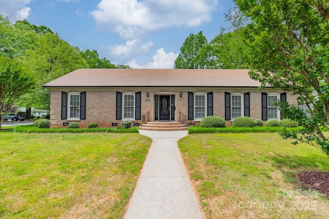 5522 Sharon Rd, Charlotte, NC 28210 - single story home featuring brick siding, a front lawn, and a shingled roof
