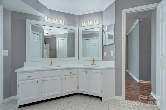 6510 Clavell Ln Unit B, Charlotte, NC 28210 - full bath with crown molding, tile patterned flooring, a sink, and baseboards