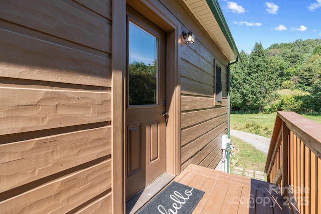 exterior space featuring a wooden deck