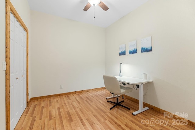 office area with ceiling fan, light wood-style floors, and baseboards