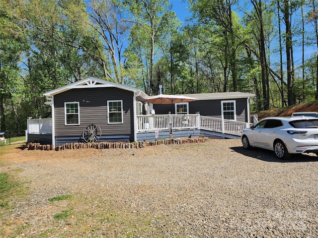 manufactured / mobile home featuring a wooden deck
