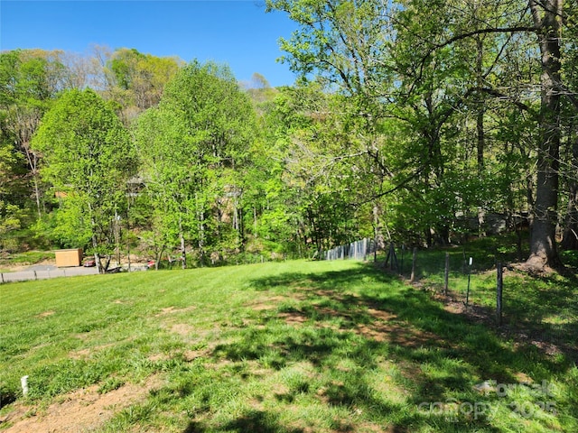 view of yard featuring fence