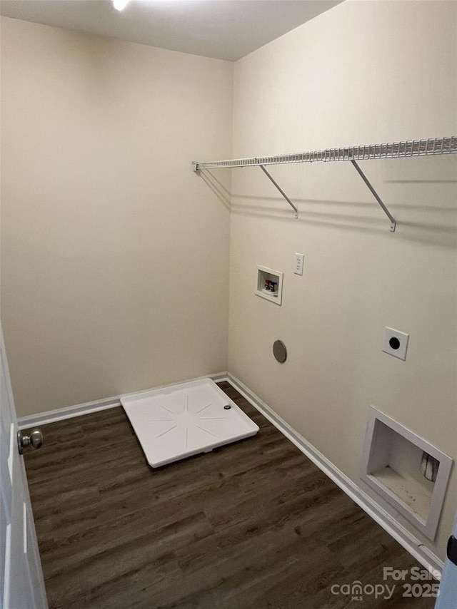 laundry area with baseboards, laundry area, electric dryer hookup, washer hookup, and dark wood-style floors