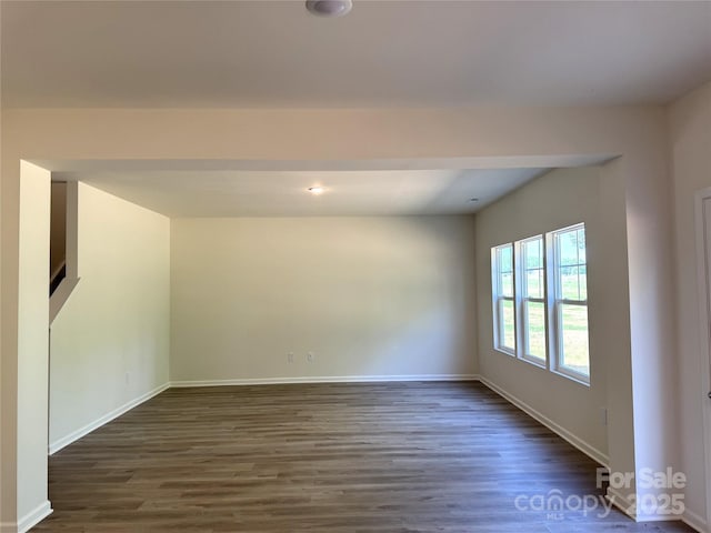 213 Salem Springs Ln, Statesville, NC 28625 - unfurnished room featuring baseboards and dark wood-type flooring