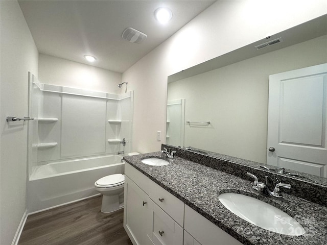 213 Salem Springs Ln, Statesville, NC 28625 - bathroom featuring toilet, wood finished floors, a sink, and visible vents