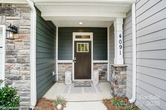4248 Black Ct Unit 232, Harrisburg, NC 28075 - entrance to property featuring stone siding and covered porch