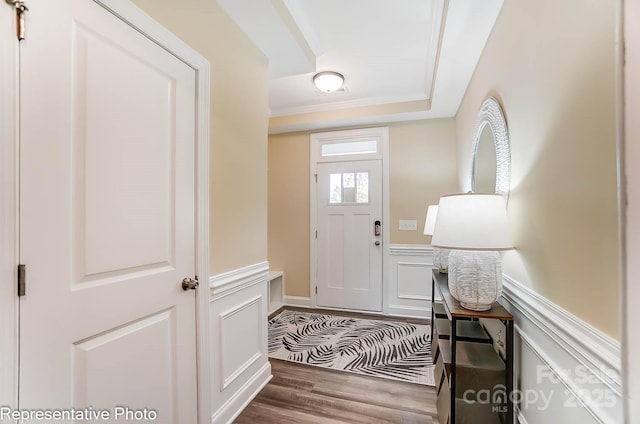 4248 Black Ct Unit 232, Harrisburg, NC 28075 - entrance foyer with wood finished floors, crown molding, and a wainscoted wall