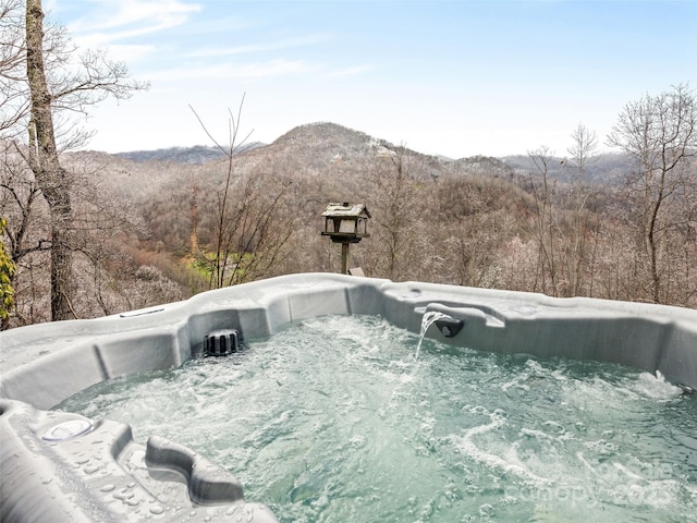 171 Jade Dr, Clyde, NC 28721 - exterior view of a hot tub and mountains