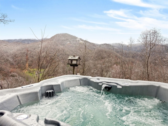 171 Jade Dr, Clyde, NC 28721 - exterior space featuring a hot tub and a mountain view