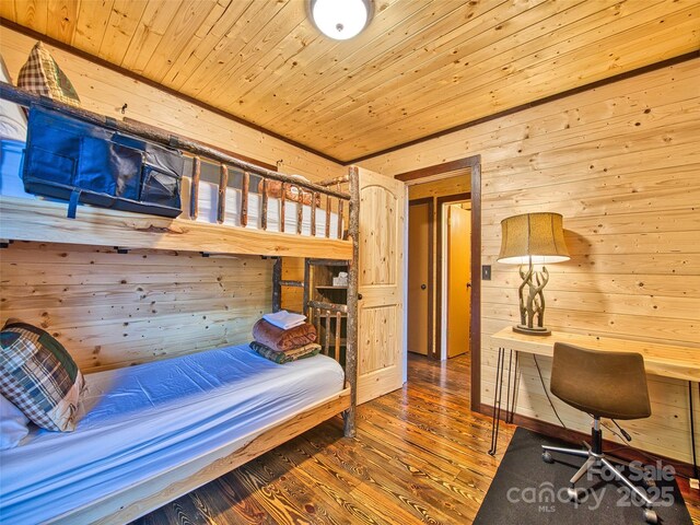 171 Jade Dr, Clyde, NC 28721 - bedroom with wood walls, wooden ceiling, and wood finished floors