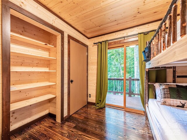 171 Jade Dr, Clyde, NC 28721 - unfurnished bedroom featuring access to outside, hardwood / wood-style flooring, wooden ceiling, and wood walls